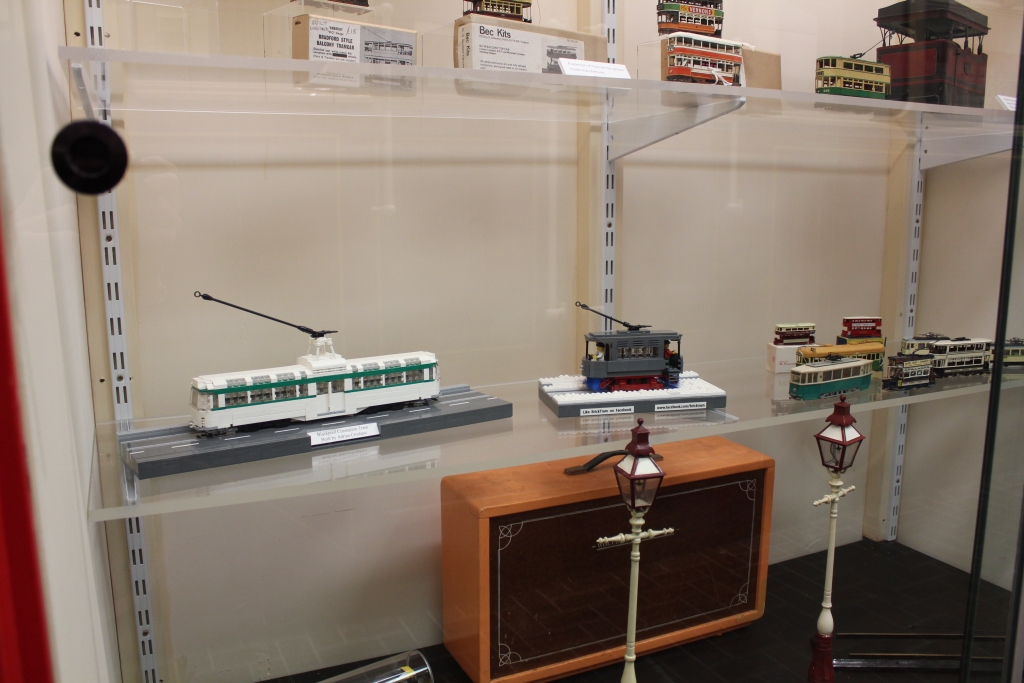 LEGO model of a Blackpool Coronation and snowbroom works tram in display case at Crich Tramway Village
