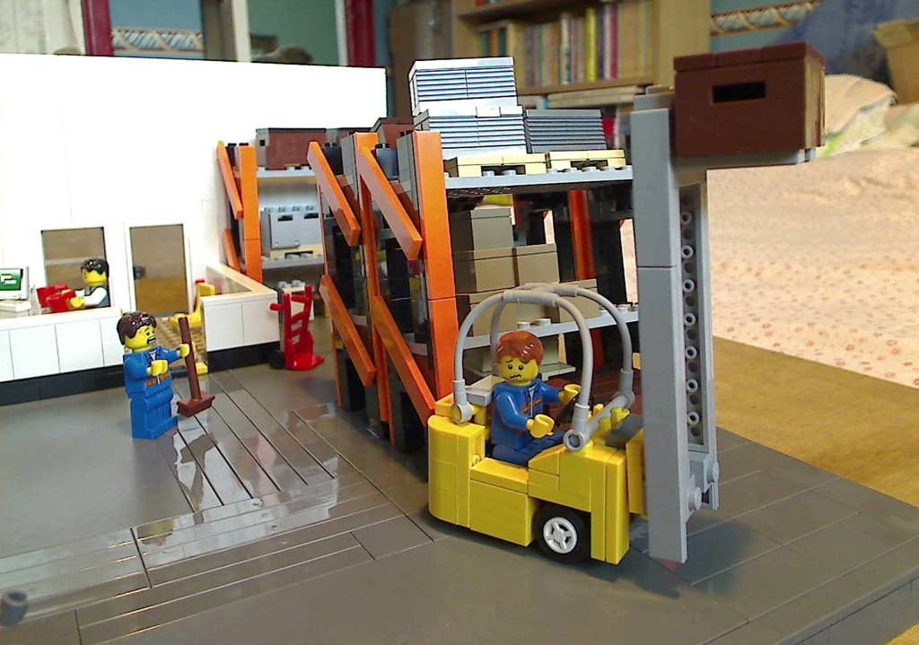 A closer view of the forklift truck inside my warehouse built from LEGO bricks.