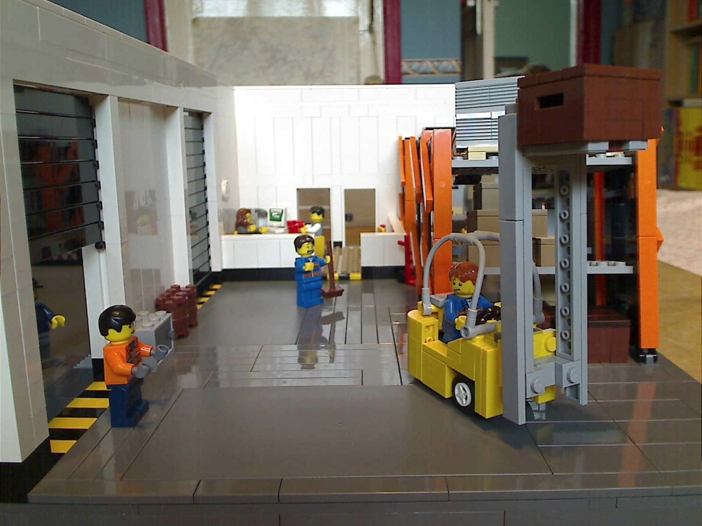 A front view of the inside area of a warehouse built from LEGO bricks.