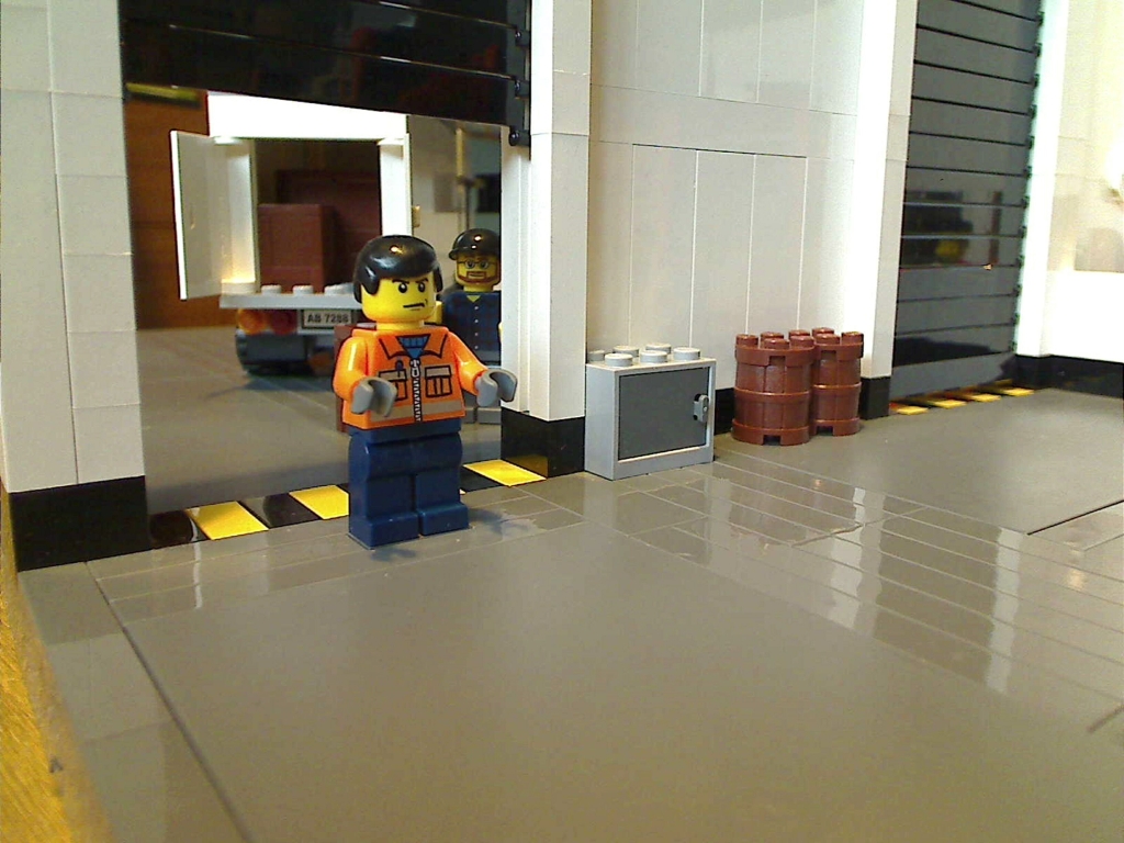A close up of the manager inside my warehouse built from LEGO bricks.